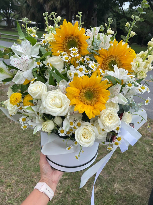 Bouquet with white roses and sunflowers